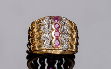 Wide ring in yellow gold gallonized setting and center...