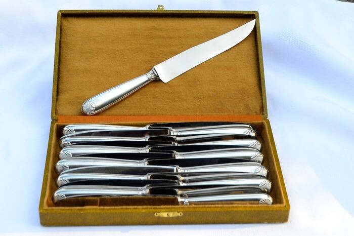 12 Christofle knives and a carving knife - .950 silver - France - First half 20th century