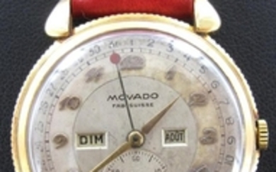 MOVADO : Montre d'homme or 750 mil., jour et mois, mouvement mécanique