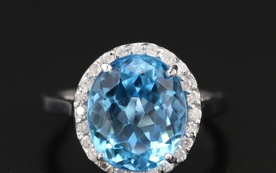 14K 6.10 CT Blue Topaz and Diamond Halo Ring