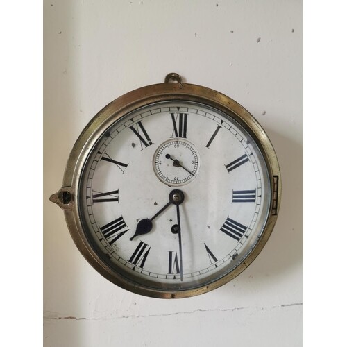 19th. C. brass ship's clock. { 25cm Dia }.