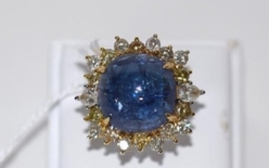 18kt white & yellow gold ladies ring with Cabochon blue