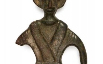An Amlash bronze statue, 1st millennium B.C.,...