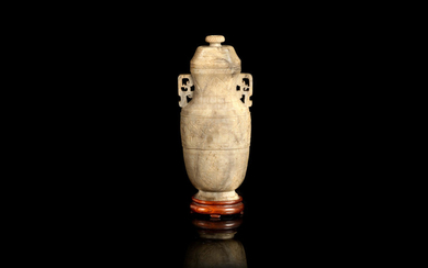 A calcified jade archaistic vase and cover