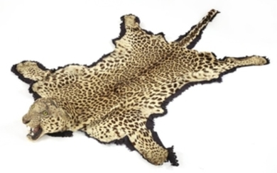 A leopard-skin rug