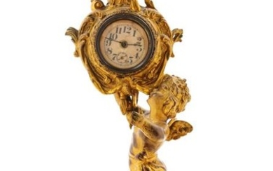 A Louis XV Style Gilt Metal Mantel Clock