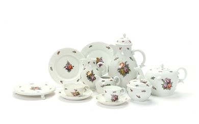 Nymphenburg porcelain lunch, coffee and tea service decorated in colours with flower bouquets and scattered flowers and border. Germany, 20th century. (70)