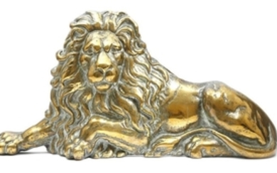 A Victorian brass model of a recumbent lion, proba…
