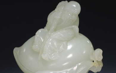 A WHITE JADE CARVING OF SHOULAO ON A PEACH, QING DYNASTY (1644-1911)
