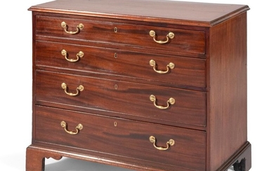 ENGLISH CHIPPENDALE CHEST OF DRAWERS In mahogany. Molded-edge top. Four graduated full-width drawers with brass pulls. Shaped bracke...
