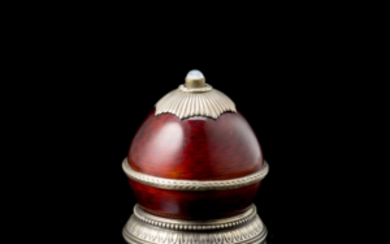 A silver-gilt, red enamel and cabochon bell. Spurious marks: Saint Petersburg 1908-1927 and K. Fabergè (cm h. 6, d. cm...