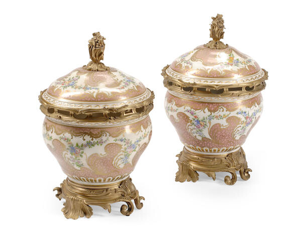 A Pair of Louis XV Style Gilt Bronze Mounted Sevres Style Porcelain Covered Urns