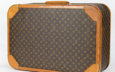 Louis Vuitton style hard-sided suitcase, executed in the signature brown monogram coated canvas, having vachetta leather trim and ha...