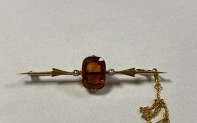 A 15ct gold bar brooch, set with a citrine flanked by seed p...