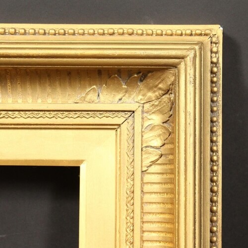 A 19th Century gilt composition frame, rebate size - 12" x 1...