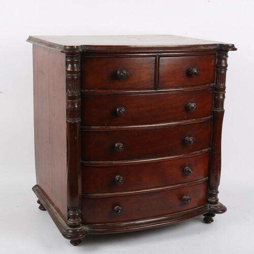A 19th century mahogany apprentice piece table-top bow-front...