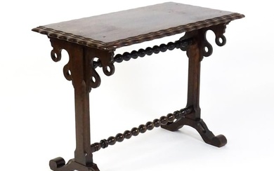 A 19thC mahogany side table with a double moulded rectangular top above two chamfered platform