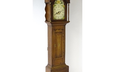 A 19thC oak cased 8-day longcase clock. The painted arch dia...