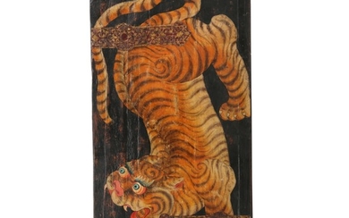 A 20th century Tibetan door decorated with a tiger, canvas mounted on wood. H. 153 cm. W. 80 cm