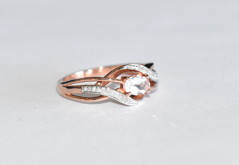 A 9ct ROSE GOLD RING