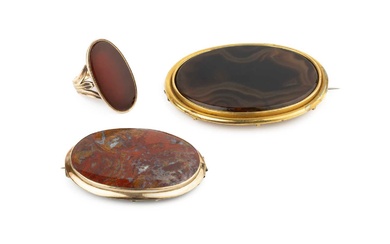 A 9ct gold and hardstone dress ring, the oval plaque...