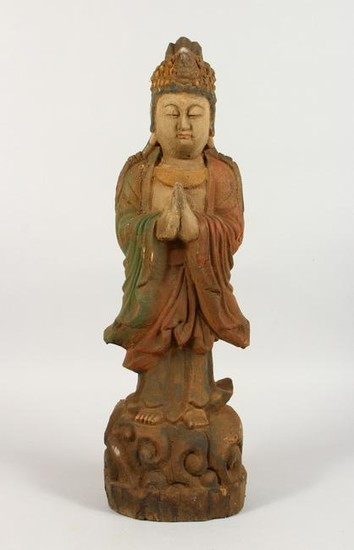 A CARVED WOOD FIGURE. 2ft high.