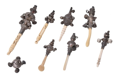 A COLLECTION OF EIGHT SILVER OR SILVER COLOURED CHILD'S RATTLES
