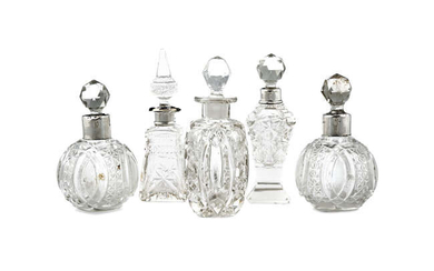 A COLLECTION OF VICTORIAN CUT GLASS SCENT BOTTLES...