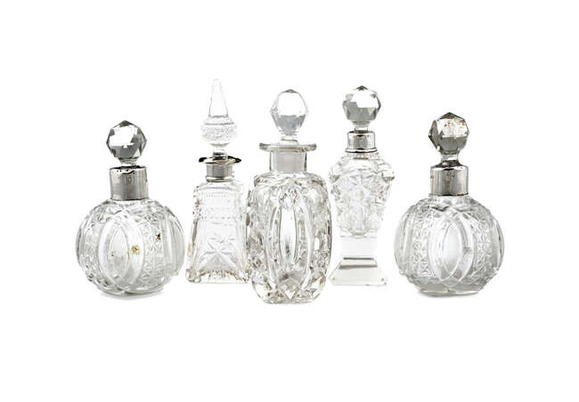 A COLLECTION OF VICTORIAN CUT GLASS SCENT BOTTLES...