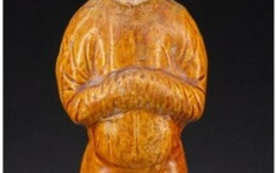A Chinese Glazed Pottery Figure 10-1/2 x 2-1/2 x