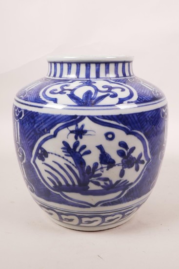 A Chinese blue and white porcelain jar with decorative panel...