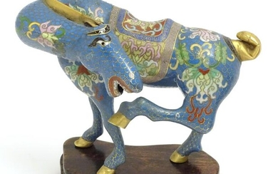 A Chinese cloisonne horse with raised back leg and