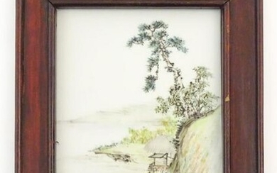 A Chinese porcelain plaque decorated with a coastal