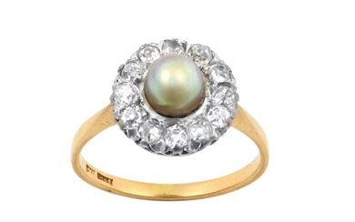 A Cultured Pearl and Diamond Ring the cultured pearl within...