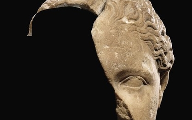 A FRAGMENTARY ROMAN MARBLE HEAD OF THE ARTEMIS OF GABII, CIRCA 1ST CENTURY A.D.