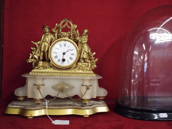 A French gilt and ormolu time-piece the drum barrel clock ha...