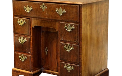 A George II Walnut and Featherbanded Bureau-Table, circa 1740, the...