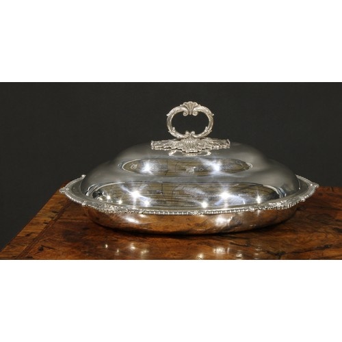 A George III silver oval entree dish, of Irish interest, the...