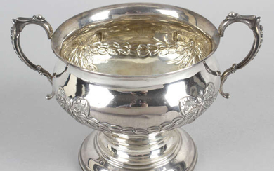 A George V silver twin-handled pedestal bowl.
