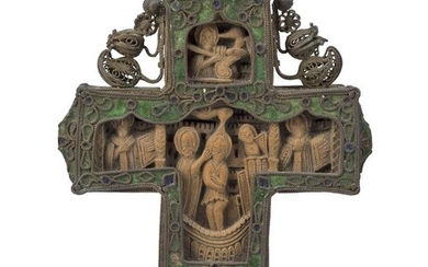 A Greek (Mount Athos) double-sided boxwood cross, 18th century, carved in relief with the Baptism and Crucifixion, the extremities with Evangelists or Church Fathers, in an enamel and filigree setting, 11cm high Provenance: The Geoffrey and Fay...