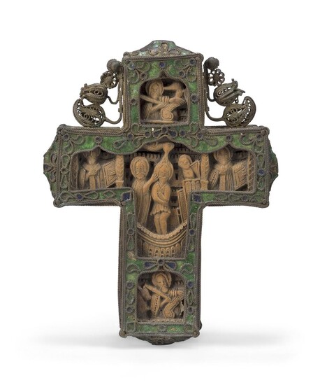 A Greek (Mount Athos) double-sided boxwood cross, 18th century, carved in relief with the Baptism and Crucifixion, the extremities with Evangelists or Church Fathers, in an enamel and filigree setting, 11cm high Provenance: The Geoffrey and Fay...