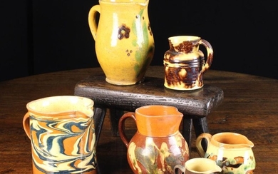 A Group of Six Decorative 19th Century French Country Jugs including three with marblised slipware g