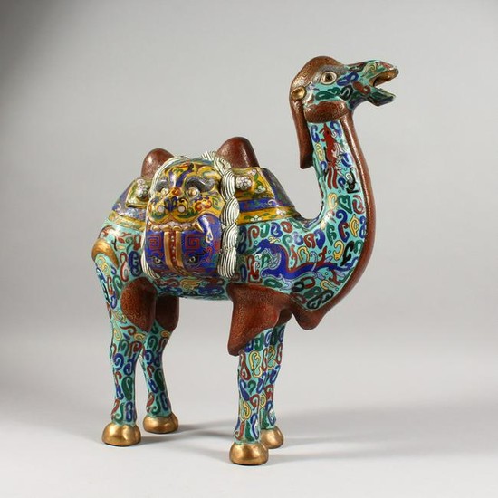 A LARGE CHINESE CLOISONNE MODEL OF A CAMEL. 18ins