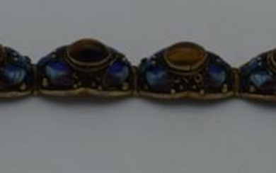 A LATE 19TH CENTURY CHINESE SILVER GILT ENAMEL AND TIGERS EYE BRACELET. 29 grams. 18cm long.