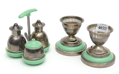 A LEWBURY BAKELITE AND EPNS CRUET SET, COMPRISING A CRUET STAND WITH A MUSTARD POT, SALTSHAKER AND PEPPER SHAKER AND TWO EGG CUPS