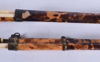 A PAIR OF 19TH CENTURY CHINESE CARVED TORTOISESHELL CHOPSTICK HOLDERS. 27 cm long.
