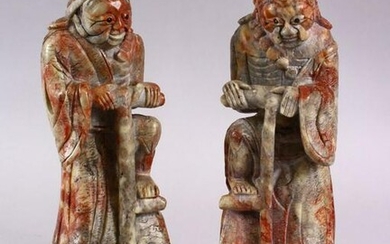 A PAIR OF CHINESE CARVED SOAPSTONE FIGURES OF DEMONS