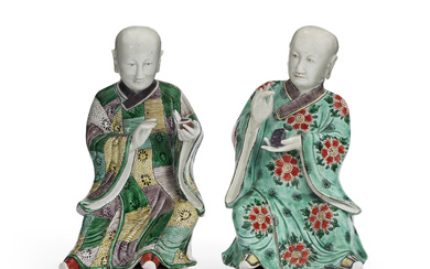 A PAIR OF CHINESE EXPORT PORCELAIN FIGURES OF SEATED LUOHANS...