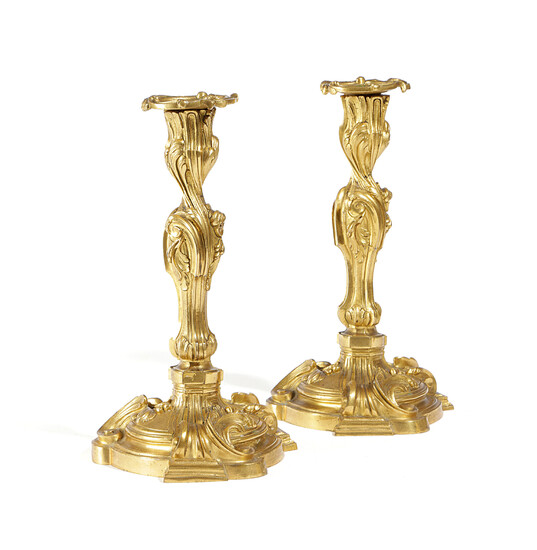 A PAIR OF FRENCH ORMOLU CANDLESTICKS IN ROCOCO STYLE