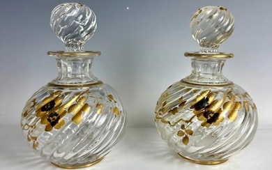 A PAIR OF GILT AND ENAMELED PERFUME BOTTLES